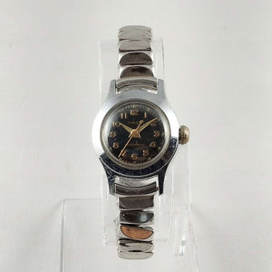 Timex Unisex Silver Tone Watch, Black Dial, Gold Tone Details