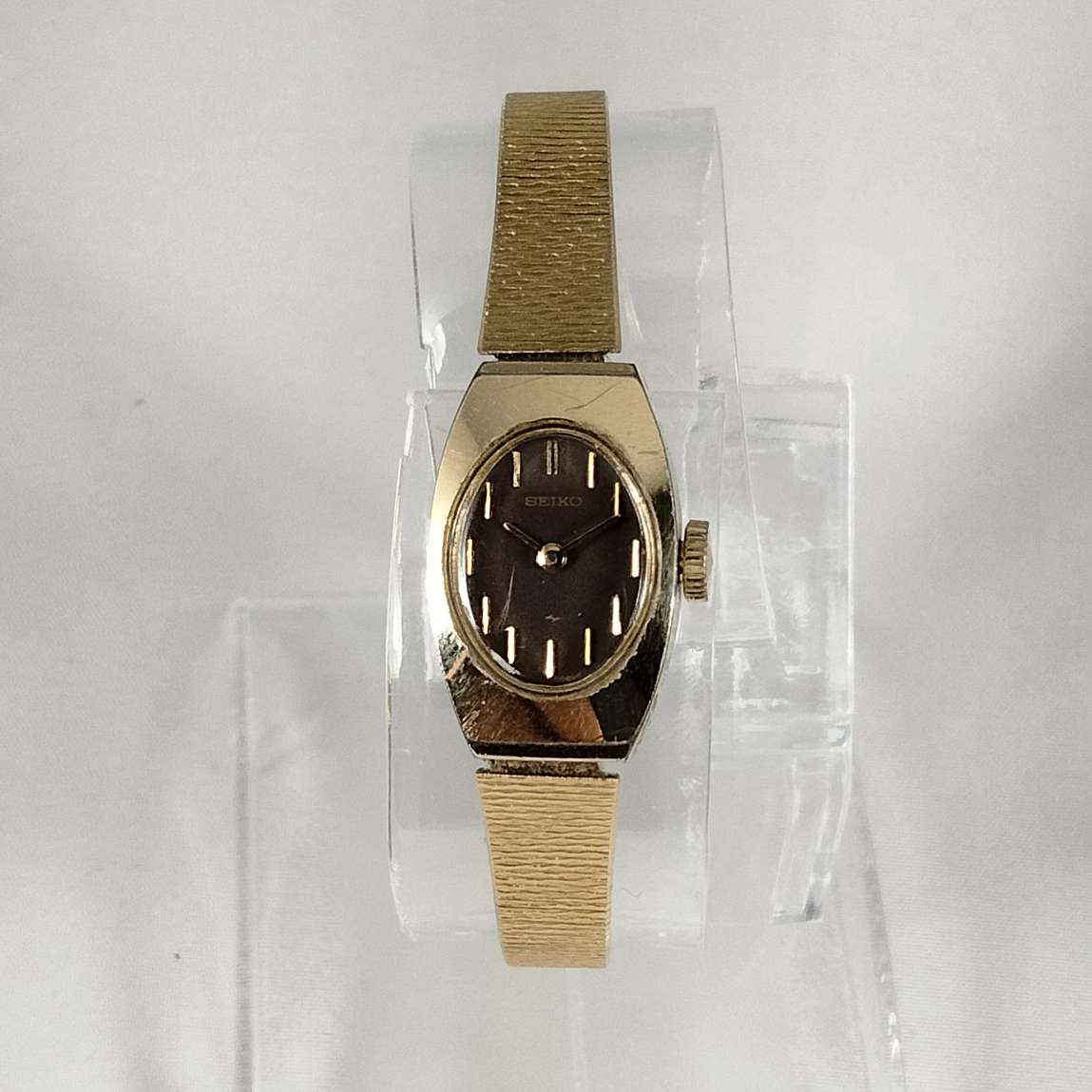 Seiko Women's Petite Watch, Wind Up, Brown Oval Dial, Gold Tone Mesh Strap
