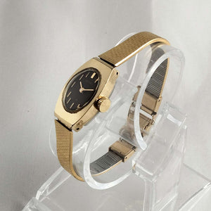 Seiko Women's Petite Watch, Oval Dial, Gold Tone Mesh Strap