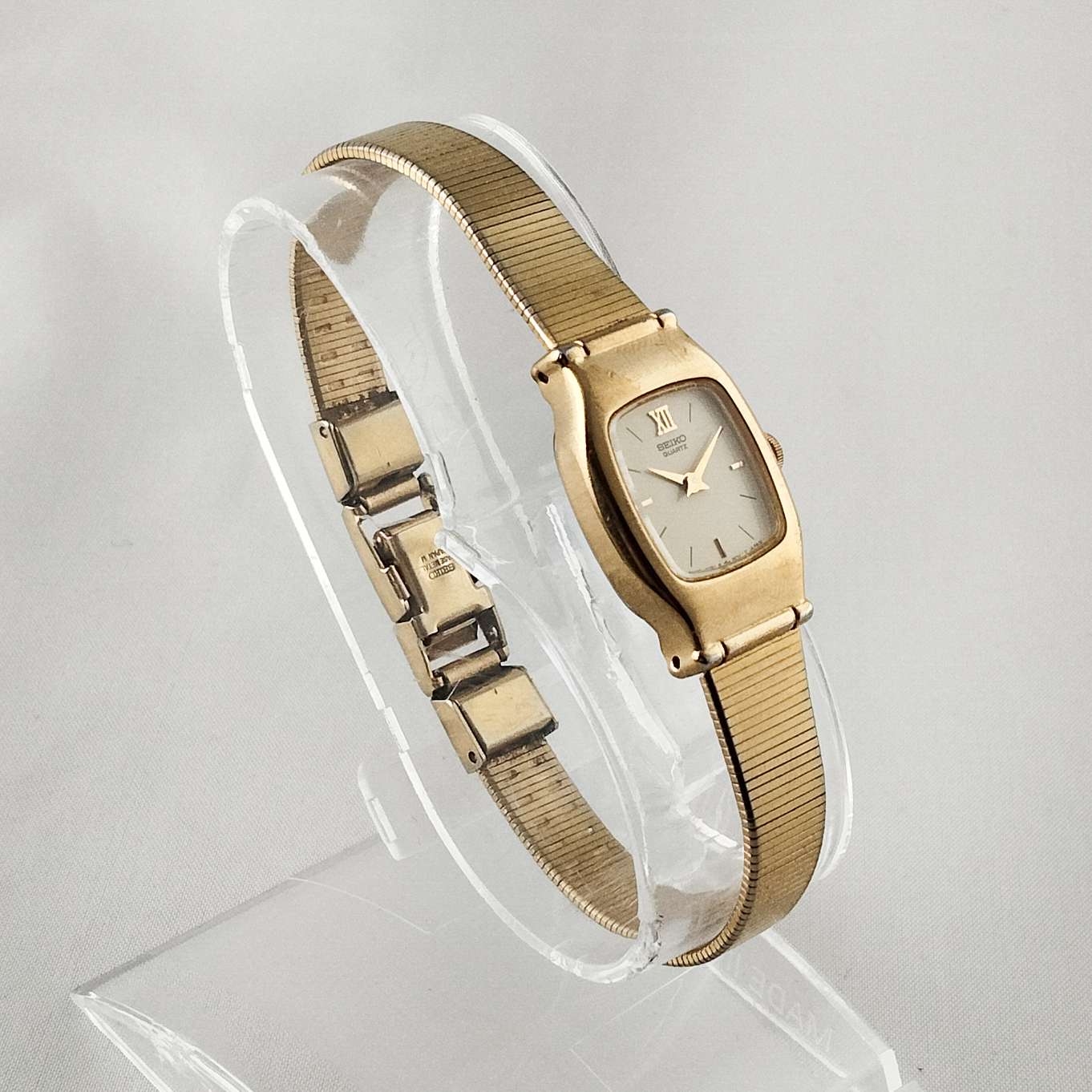 Seiko Women's Watch, White Dial with Gold Tone Details, Bracelet Strap