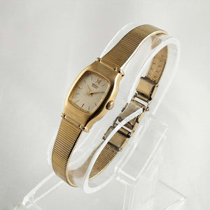 Seiko Women's Watch, White Dial with Gold Tone Details, Bracelet Strap