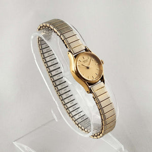 Seiko Women's Gold Tone Watch, Round Dial, Gold Dial, Stretch Strap