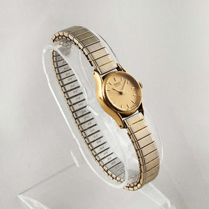 Seiko Women's Gold Tone Watch, Round Dial, Stretch Strap