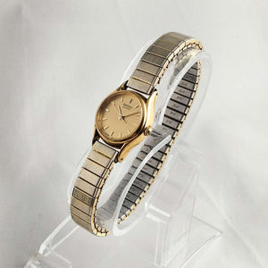 Seiko Women's Gold Tone Watch, Round Dial, Gold Dial, Stretch Strap