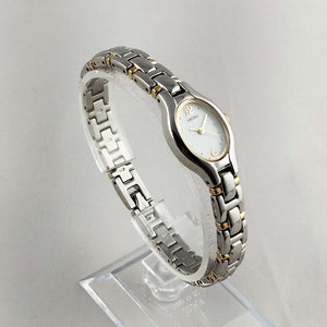 Seiko Women's Watch, Oval Dial, Silver and Gold Tone Details, Bracelet Strap