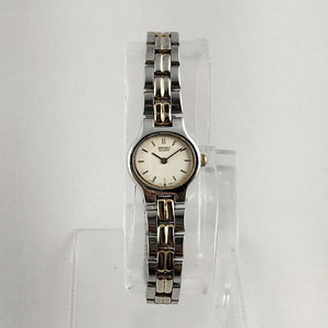 Seiko Women's Petite Watch, Silver and Gold Tone, Bracelet Strap