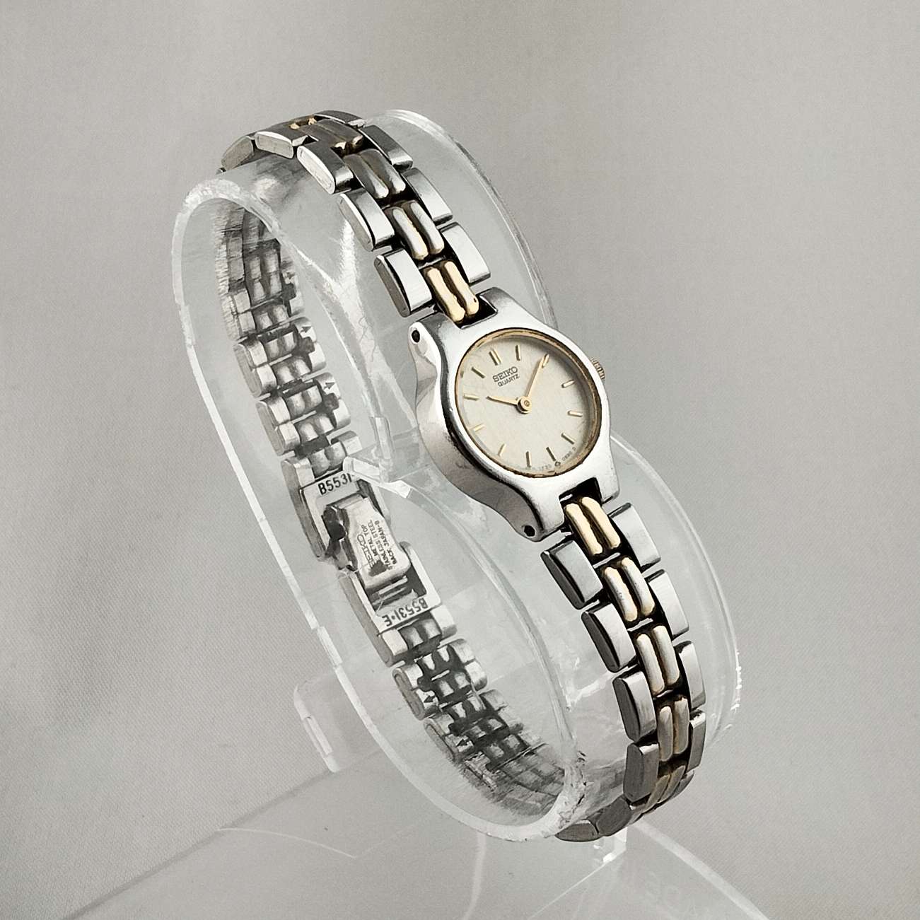 Seiko Women's Petite Watch, Silver and Gold Tone, Bracelet Strap