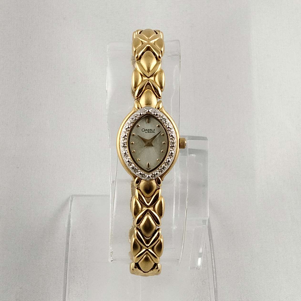 Carvelle by Bulova Gold Tone Women's Watch, Jeweled Oval Dial, Linked Bracelet Strap