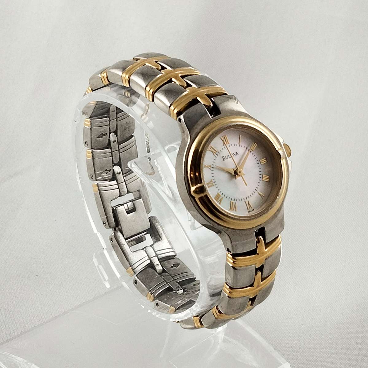 Bulova Silver and Gold Tone Watch, Mother of Pearl Dial, Linked Bracelet Strap