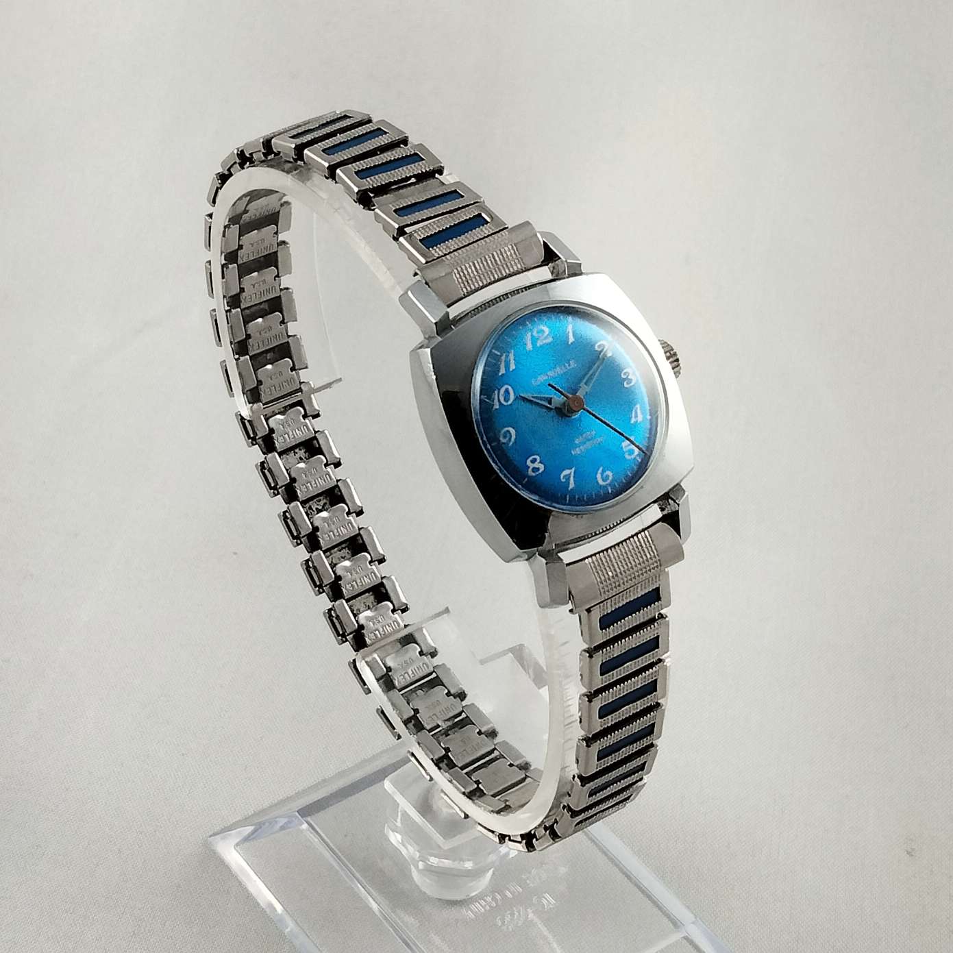 Carvelle by Bulova Watch, Silver Tone, Shiny Blue Dial, Wind Up, Stretch Strap with Inset Blue Detail