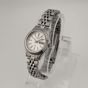 Citizen Women's Petite Silver Tone Watch, Round Dial, Date and Day, Link Strap