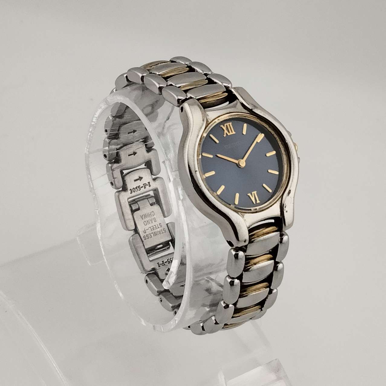 Seiko Petite Silver Tone Watch, Gold Tone Accents, Circular Blue Dial, Bracelet Strap