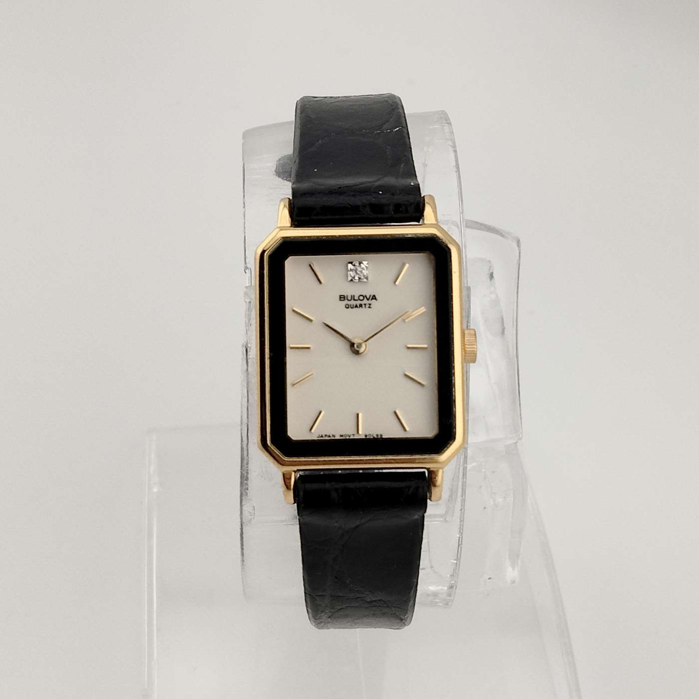 Petite Bulova Watch, White Rectangular Dial, Gold Tone Accents, Black Genuine Leather Strap