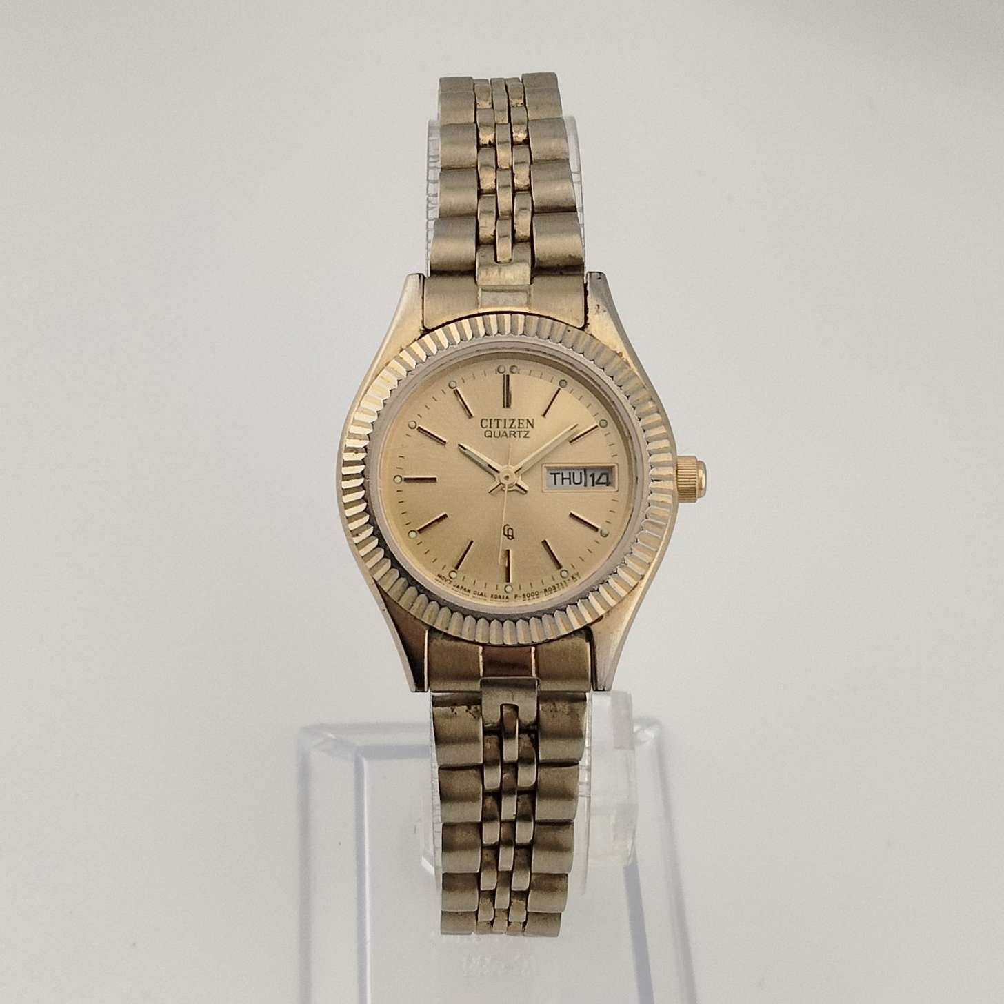 Citizen Unisex Gold Tone Watch, Round Dial, Date and Day Window, Bracelet Strap