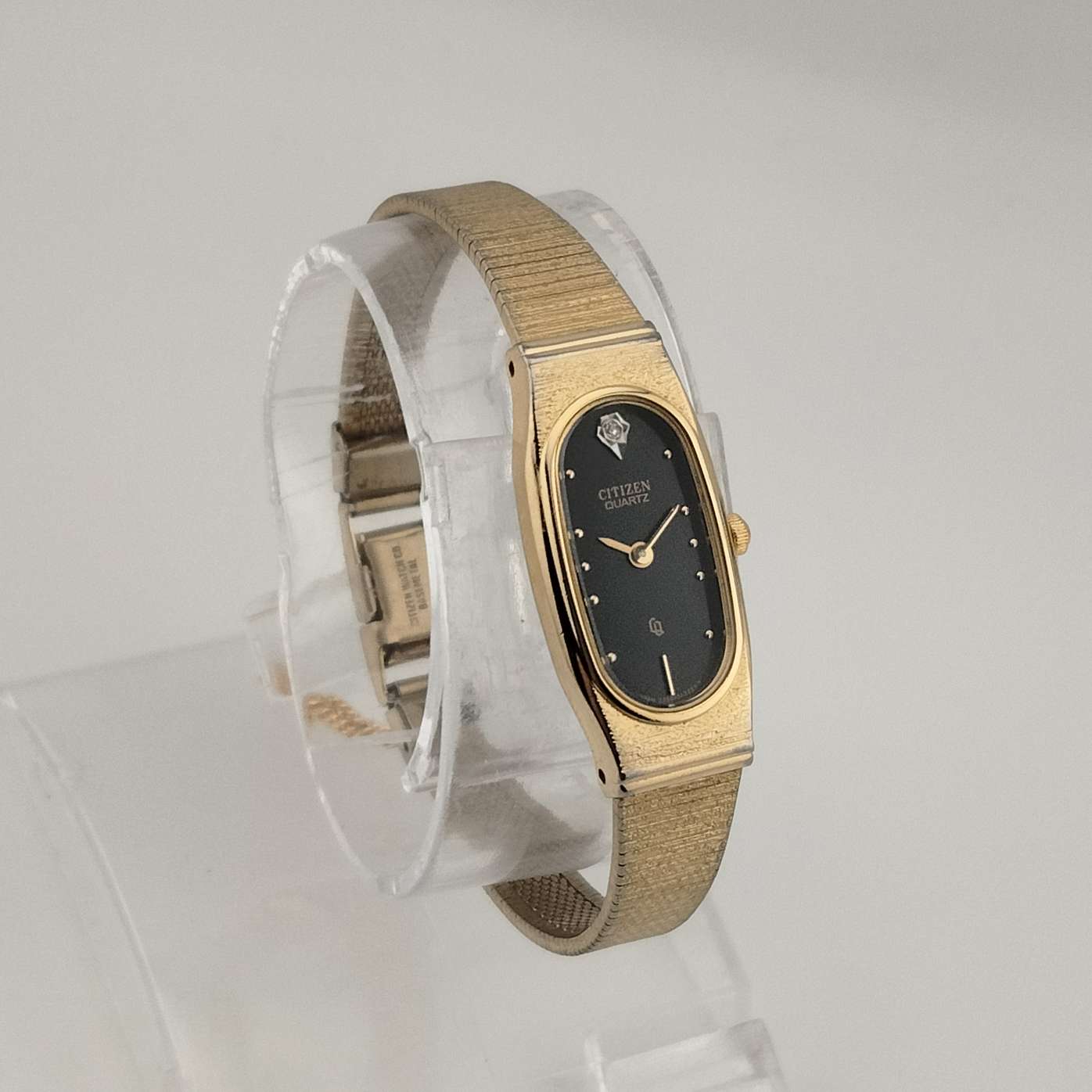 Citizen Petite Quartz, Gold Tone Watch, Elongated Black Oval Dial, Jewel Detail, Bracelet Strap