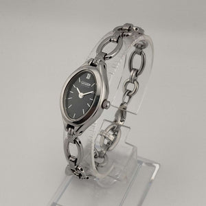 Citizen "Eco Drive" Silver Tone Watch, Black Oval Dial, Heart Charm, Link Strap