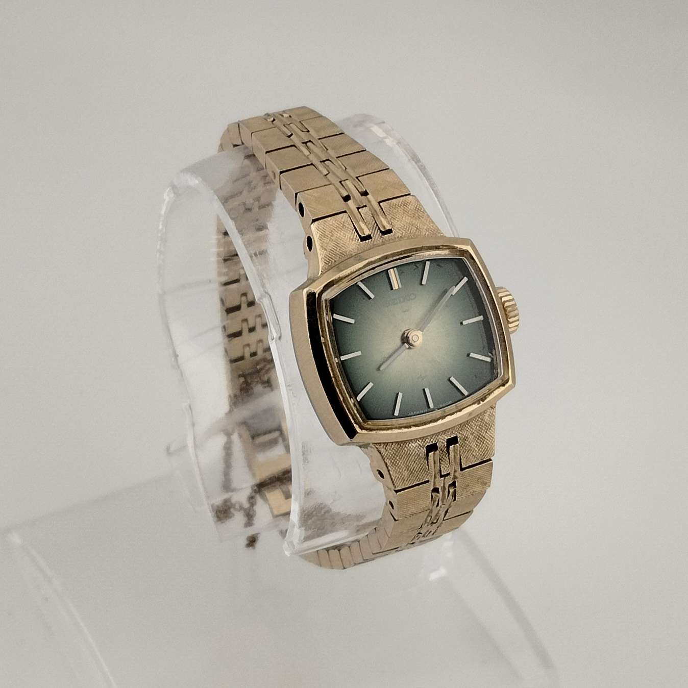 Seiko Petite Gold Tone Watch, Emerald Tone Rectangle Dial, Bracelet Strap