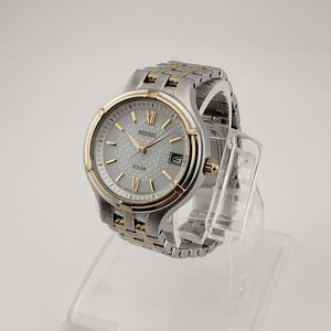Seiko Unisex Silver Tone Watch, Gold Tone Details, Circular Dial, Date Window, Bracelet Strap