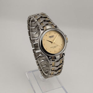 Seiko Unisex Gold and Silver Tone Watch, Circular Dial, Bracelet Strap