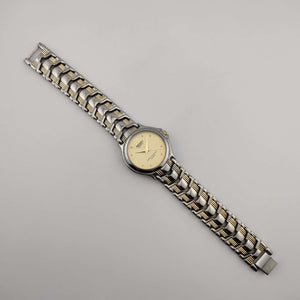 Seiko Unisex Gold and Silver Tone Watch, Circular Dial, Bracelet Strap