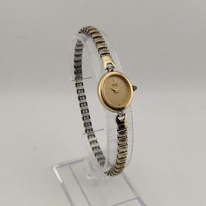 Seiko Women's All Gold Tone Quartz Watch, Oval Dial, Jewel Detail, Stretch Strap