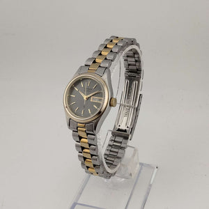 Citizen Men's Silver Tone Quartz Watch, Gold Tone Accents, Round Grey Dial, Date and Day Window, Bracelet Strap