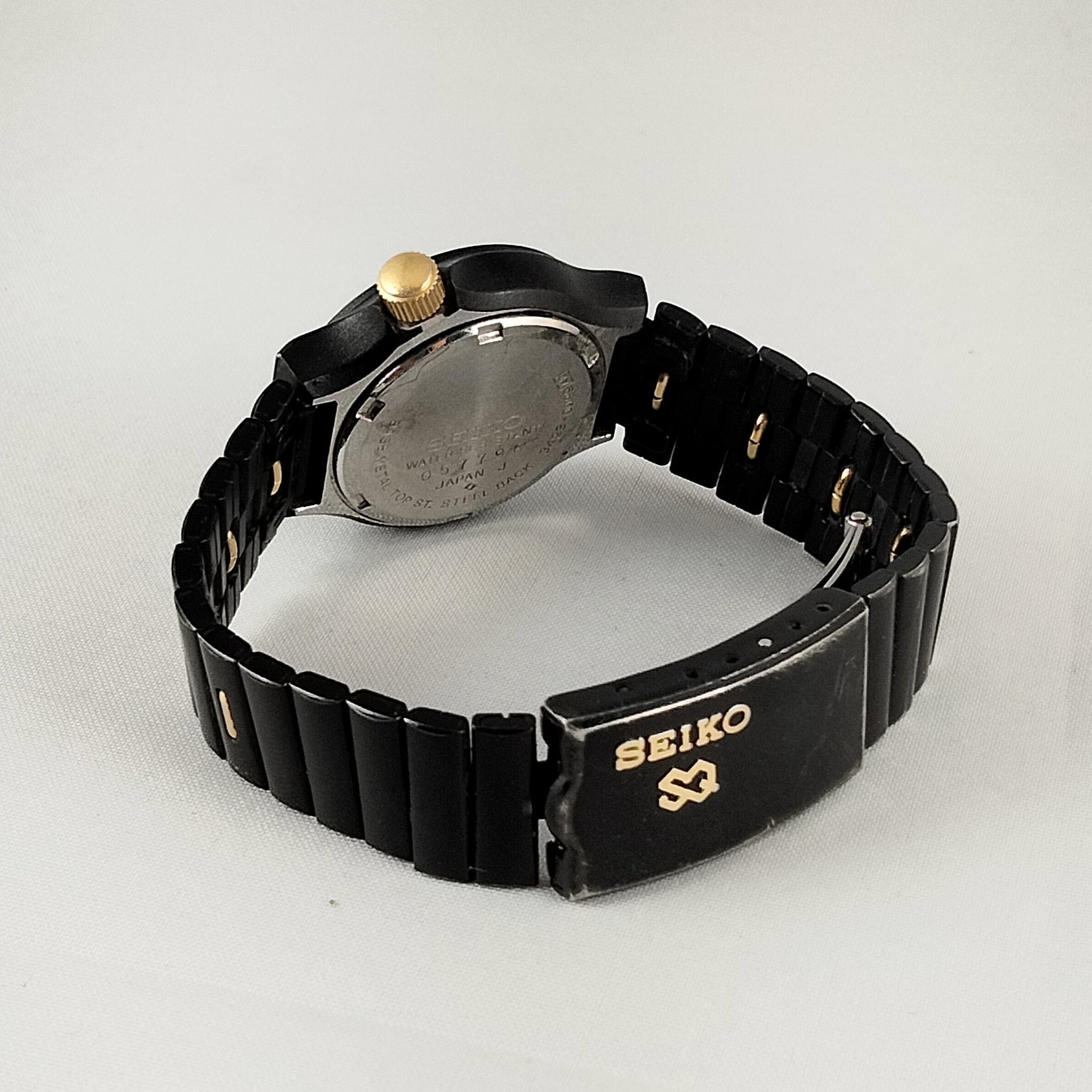 Seiko black and gold watch on sale