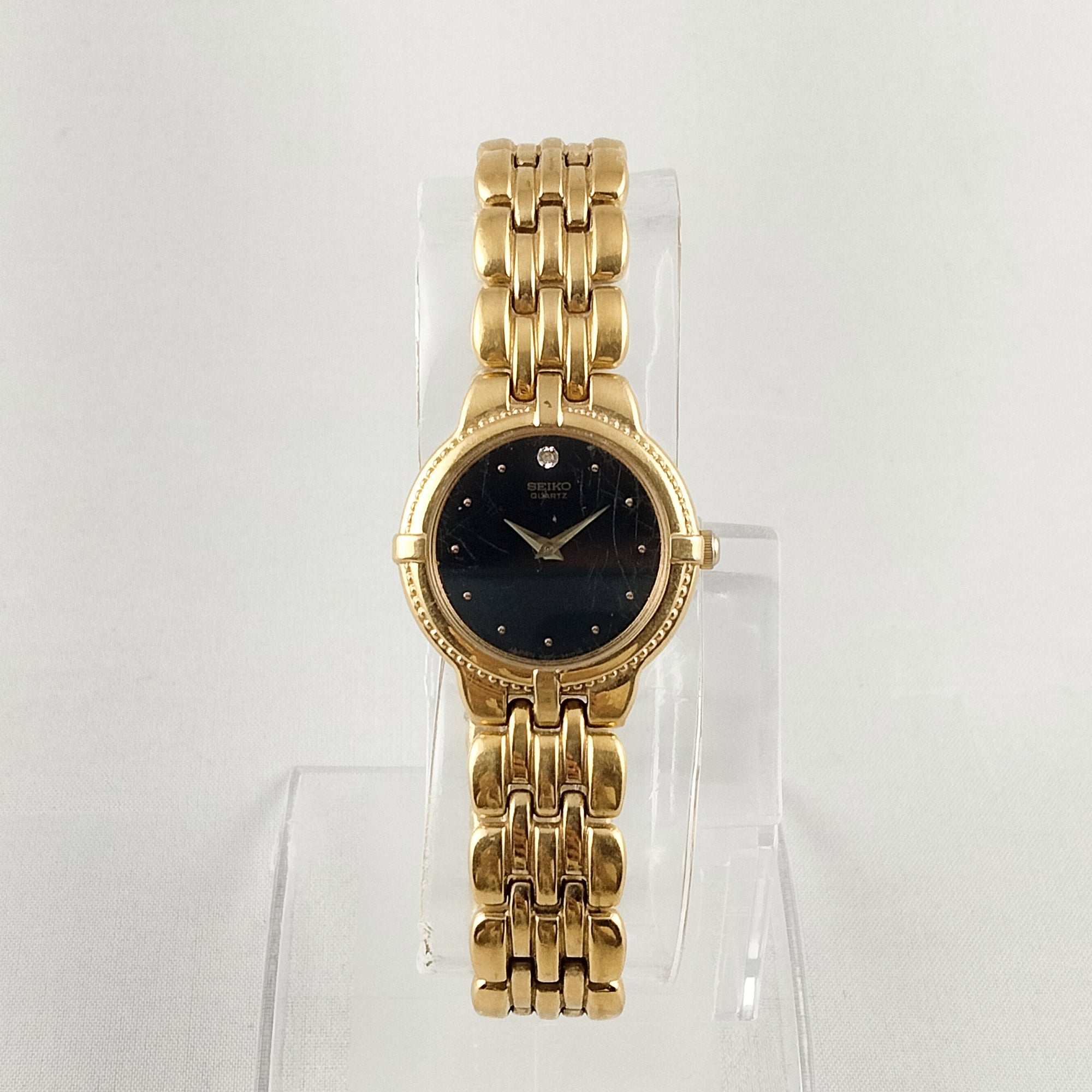 Seiko Women's Gold Tone Watch, Black Dial, Gem Detail, Bracelet Strap