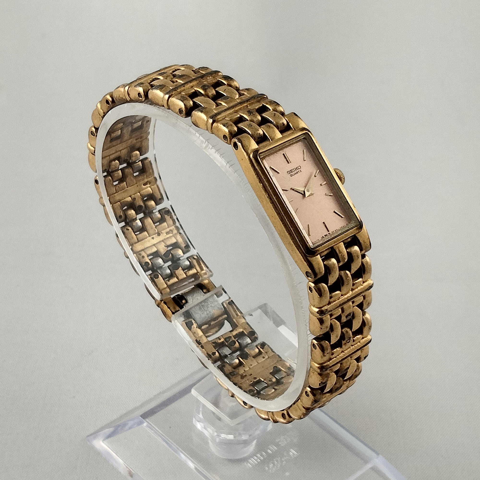 Seiko Women's Gold Tone Watch, Pink Rectangular Dial, Bracelet Strap