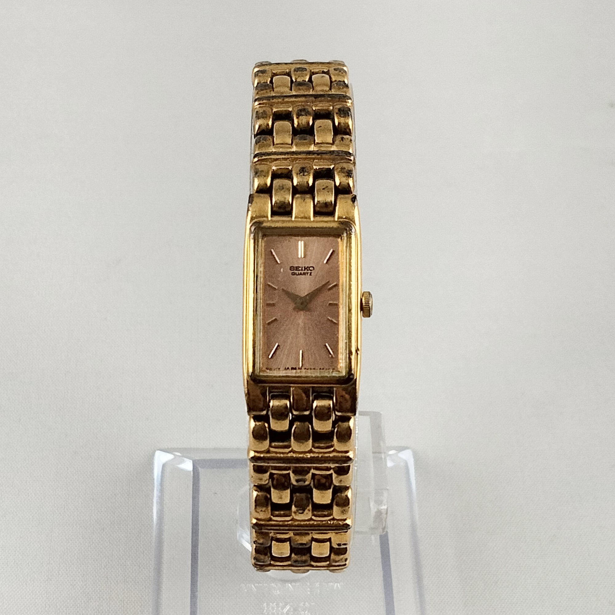 Seiko Women's Gold Tone Watch, Pink Rectangular Dial, Bracelet Strap