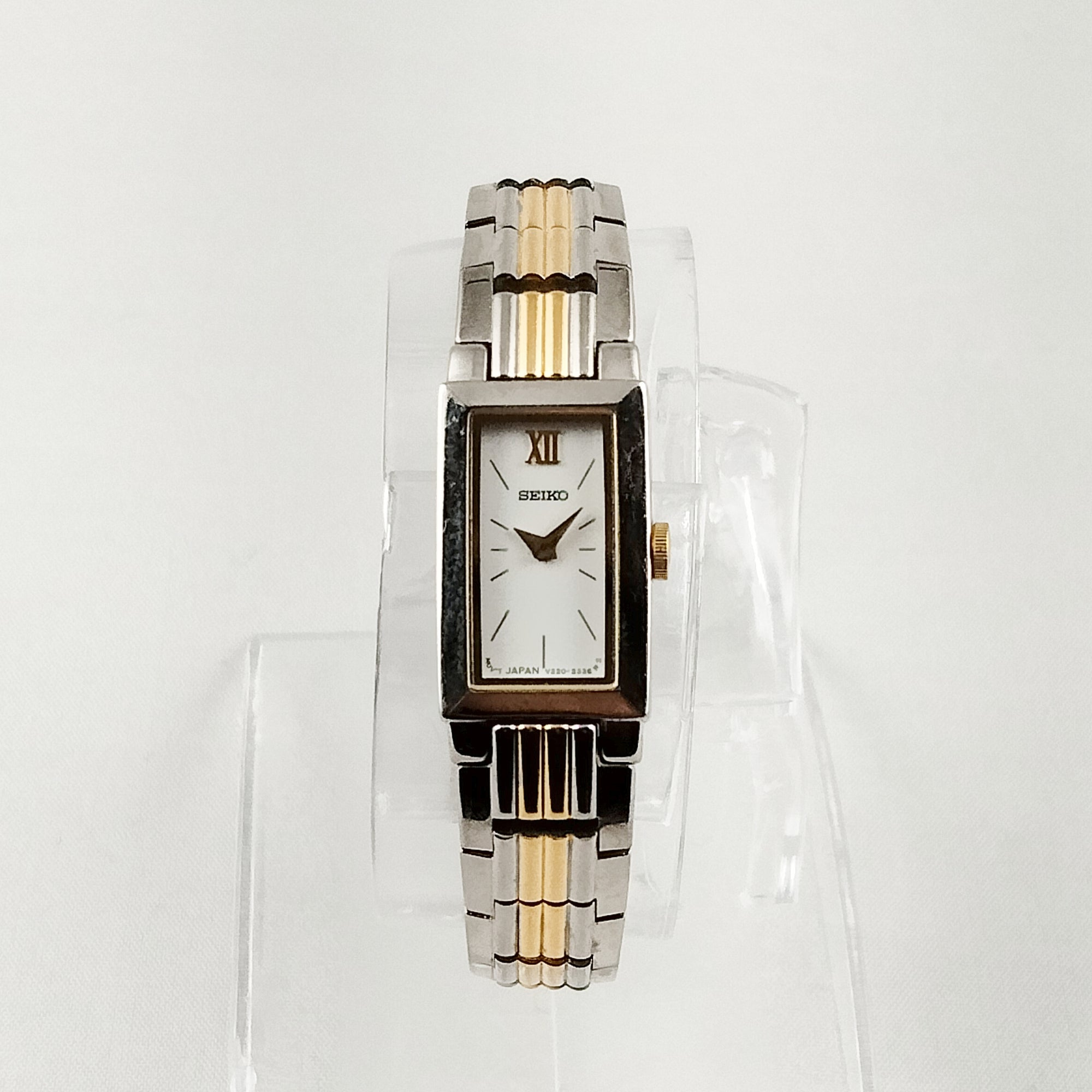 Seiko Women's Silver and Gold Tone Watch, White Rectangular Dial, Bracelet Strap