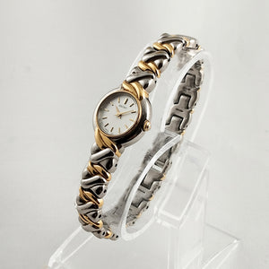 Seiko Women's Petite Silver and Gold Tone Watch, Bracelet Strap