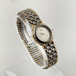 Seiko Unisex Silver and Gold Tone Watch, Bracelet Strap