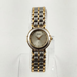 Seiko Unisex Silver and Gold Tone Watch, Bracelet Strap