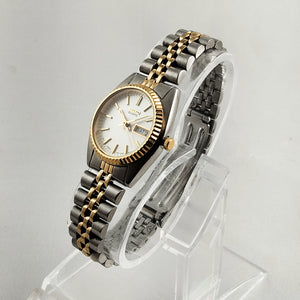Seiko Unisex Silver and Gold Tone Watch, White Dial, Bracelet Strap