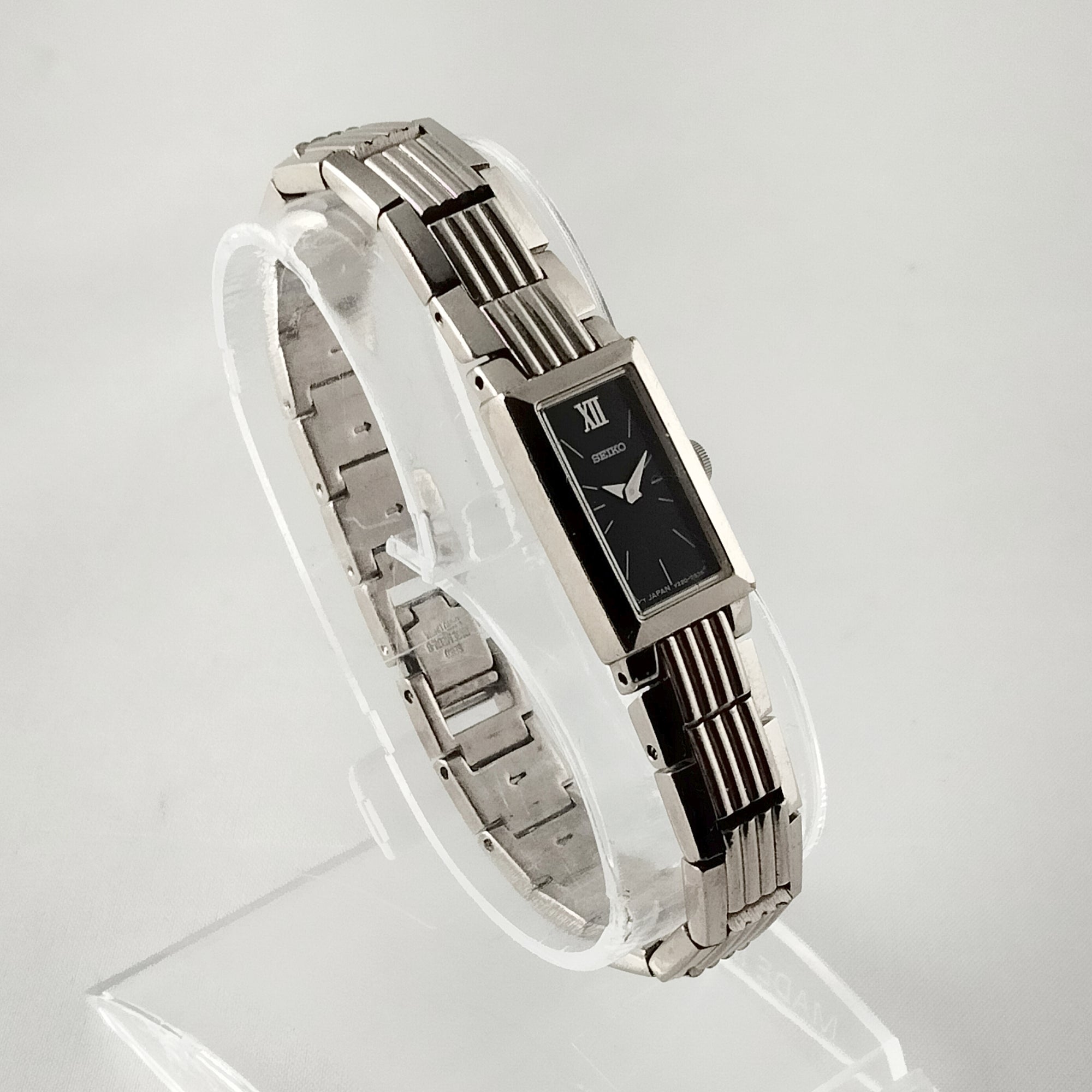 Seiko Women's Petite Silver Tone Watch, Black Rectangular Dial, Bracelet Strap