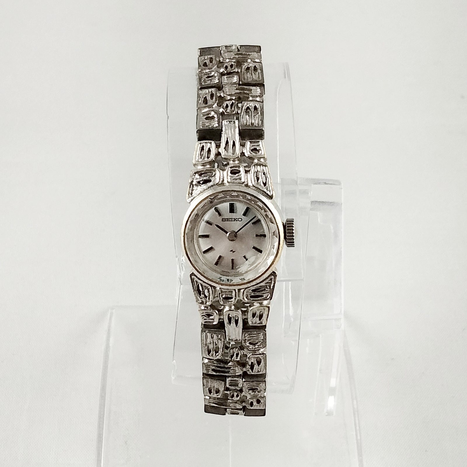 Seiko Women's Petite Silver Tone Watch, Wind Up, Faceted Details, Unique Bracelet Strap