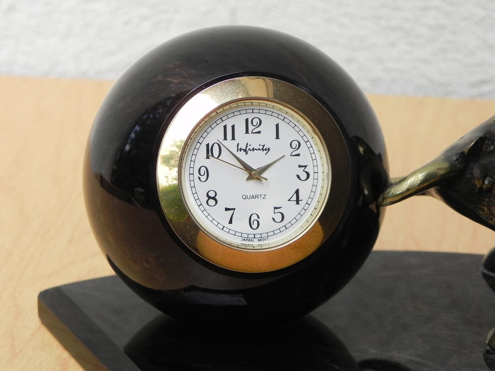 I Like Mike's Mid Century Modern Clock Brass Bull Pushing Black Marble Ball Desk Clock Sculpture
