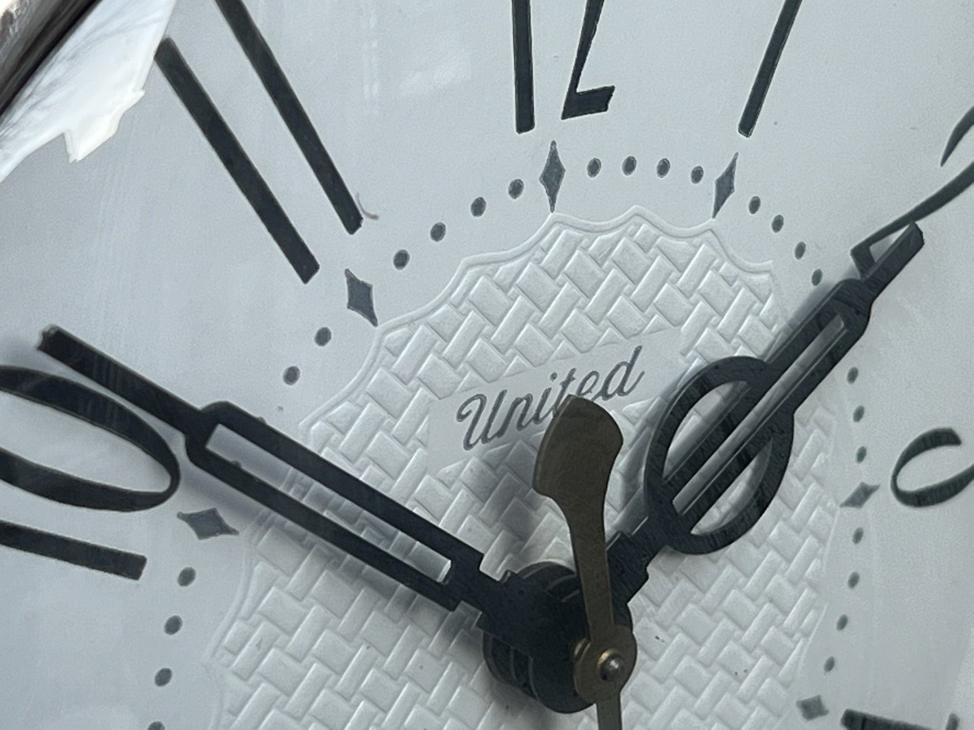 I Like Mike's Mid Century Modern Clock Round White Chrome Electric Wall Clock by United Clocks