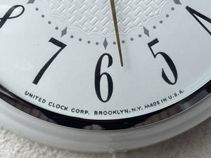 I Like Mike's Mid Century Modern Clock Round White Chrome Electric Wall Clock by United Clocks