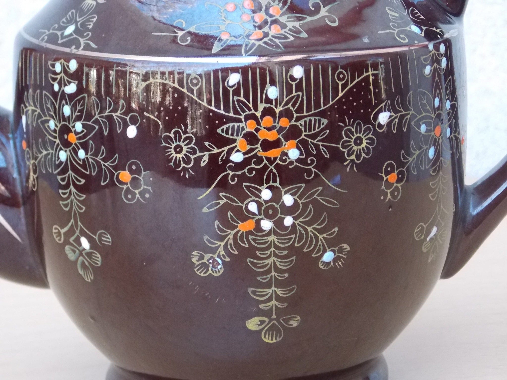 https://www.mikesmcm.com/cdn/shop/files/i-like-mike-s-mid-century-modern-coffee-servers-tea-pots-small-brown-ceramic-hand-painted-tea-pot-made-in-japan-29069483475032_2048x.jpg?v=1690348146
