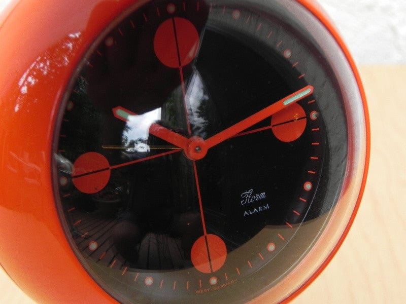 I Like Mike's Mid Century Modern Florn Orange Round Pedestal Alarm Clock