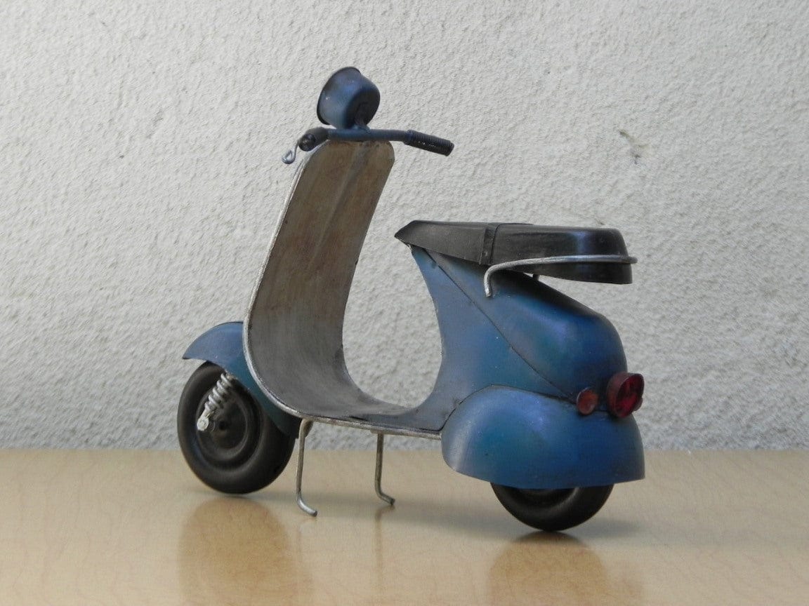 The Unique Vespa S Miniature Made from Wood with White Background