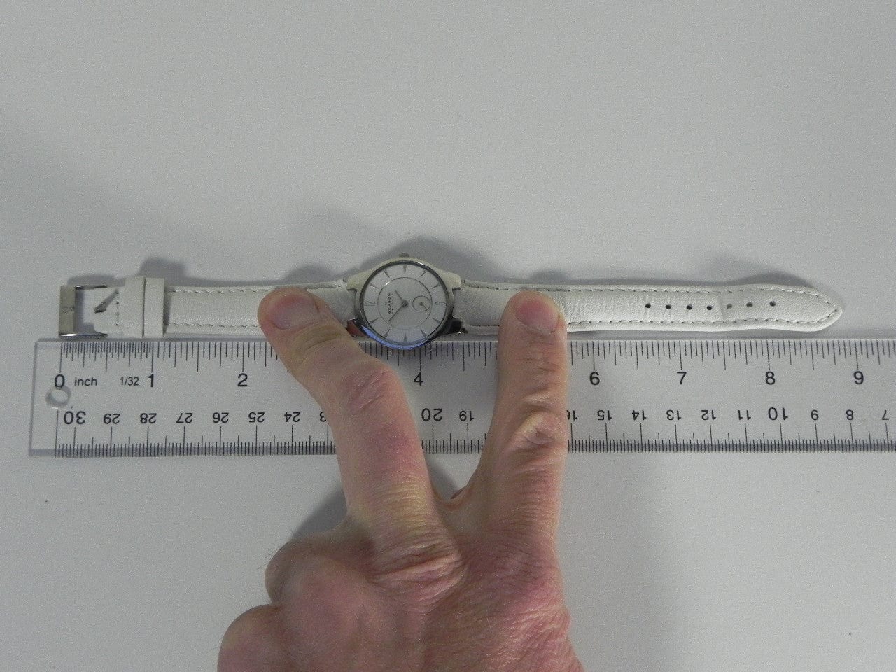 I Like Mike's Mid Century Modern Watch Skagen Unisex Silvertone Round Watch, Modern Silver Dial, White Leather Band