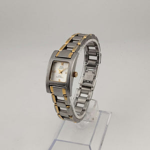I Like Mikes Mid Century Modern Watches Anne Klein Women's Silver Tone Watch, Gold Tone Accents, Rectangular Dial, Link Strap