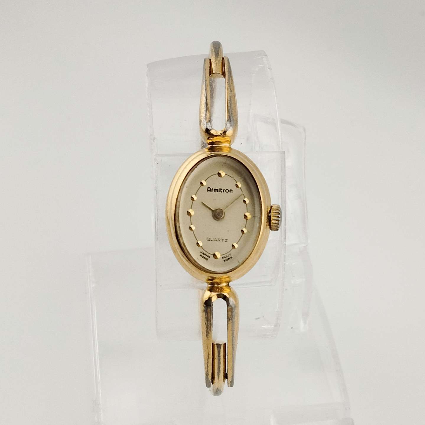 I Like Mikes Mid Century Modern Watches Armitron Petite Quartz Watch, Gold Tone, Oval Dial, Adjustable Bangle Strap