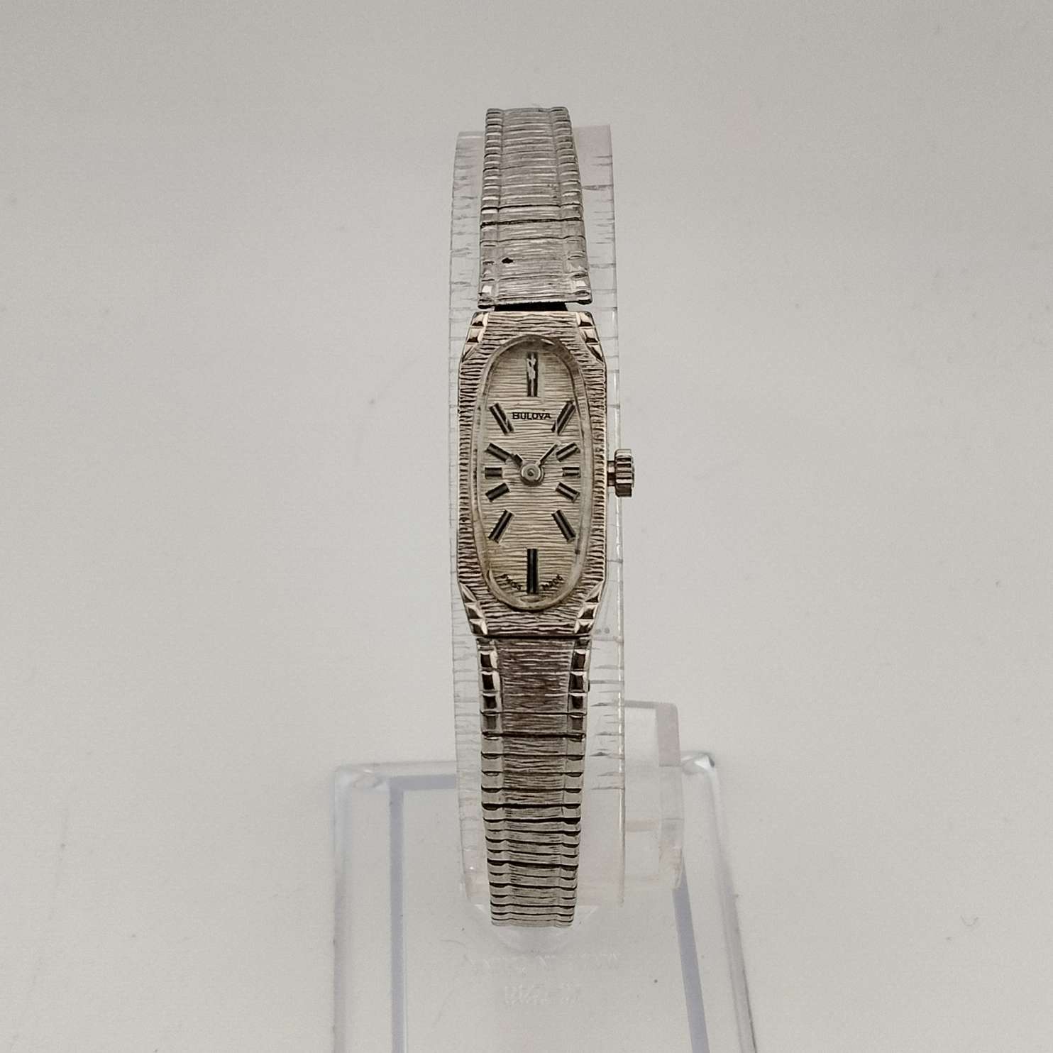 I Like Mikes Mid Century Modern Watches Bulova Women's  Petite Silver Tone Watch, Elongated Oval Dial, Stripe Patterning, Adjustable Bracelet Strap