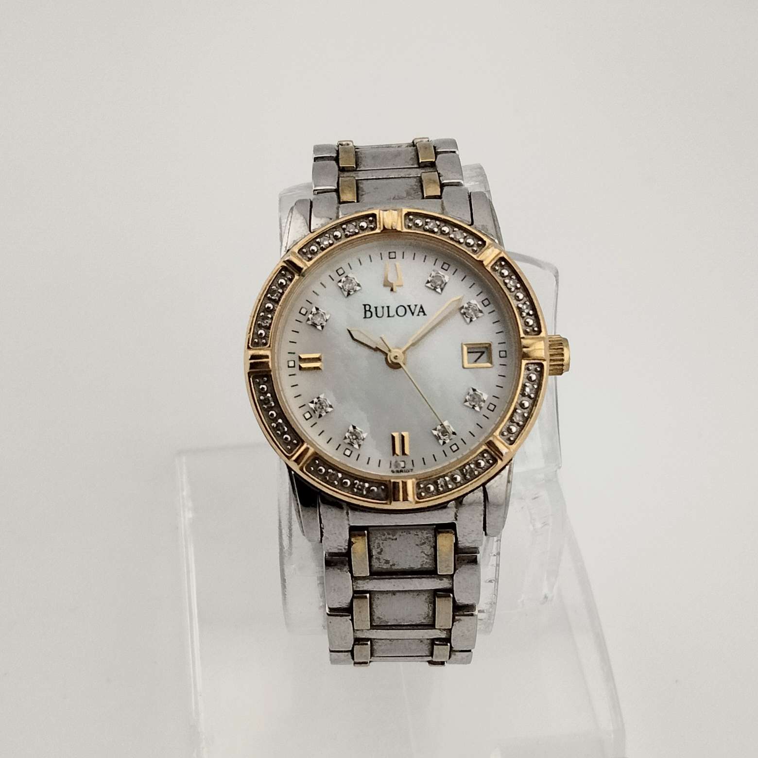Bulova Women's Silver and Gold Tone Watch, Mother of Pearl Dial, Date