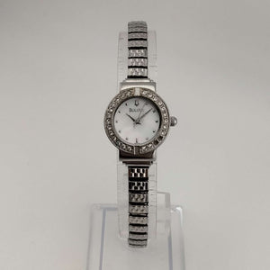 I Like Mikes Mid Century Modern Watches Bulova Women's Silver Tone Watch, Circular Mother of Pearl Dial, Jeweled Bezel, Stretch Strap