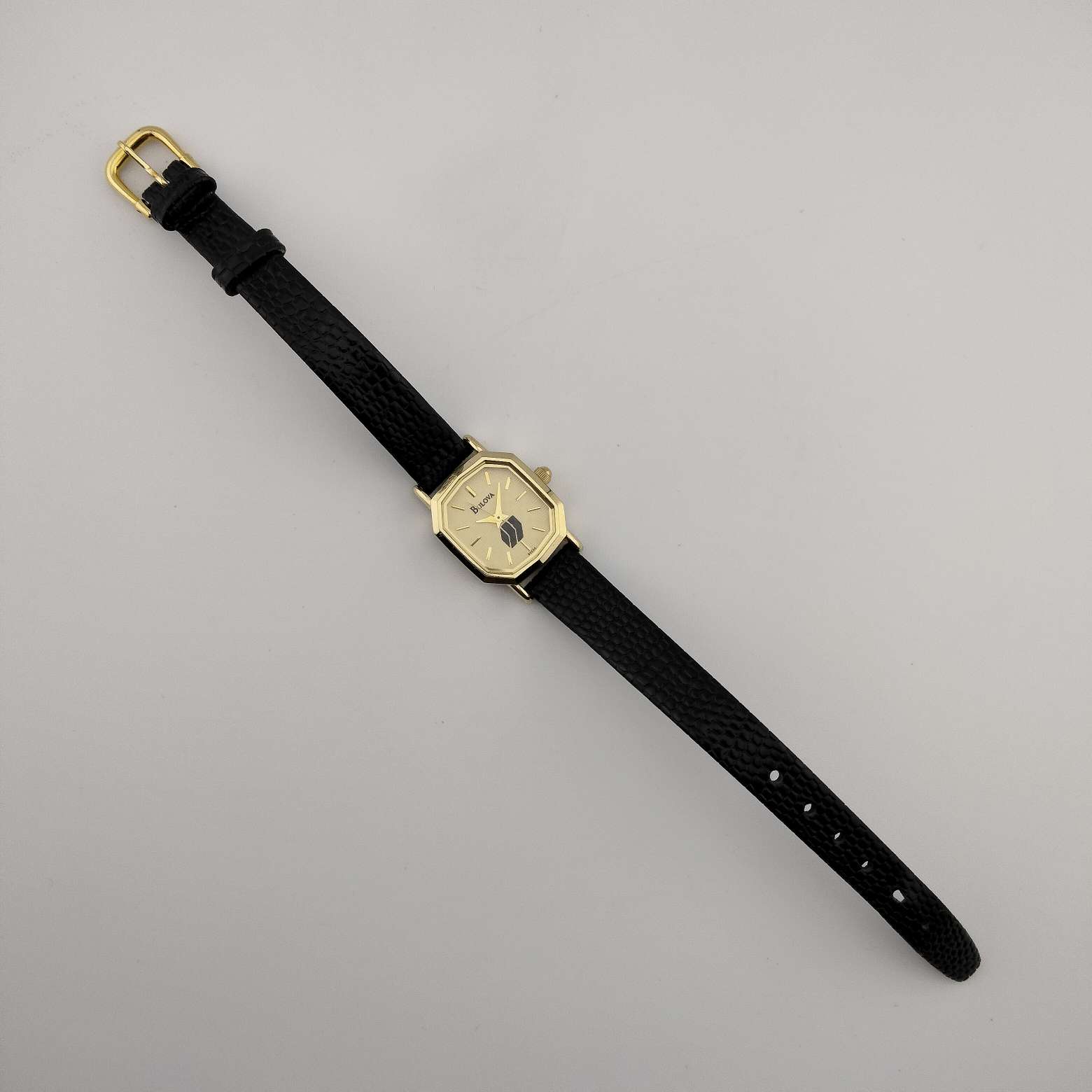 Bulova Women's Watch, Unique Gold Tone Decagon Dial, Genuine Black Lea ...